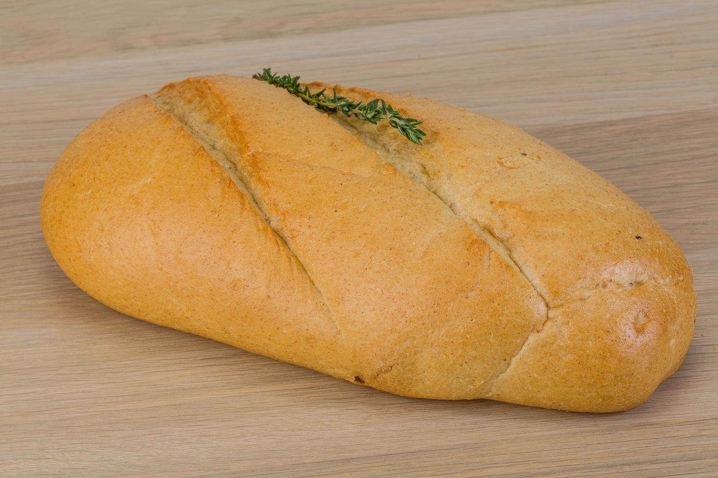 Baguette bread on wood photo