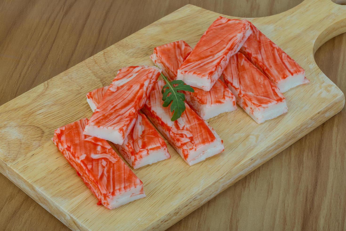 Crab sticks on wood photo