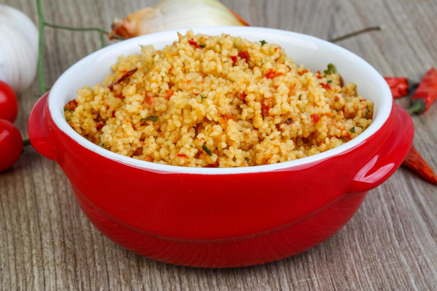 Couscous on wood photo