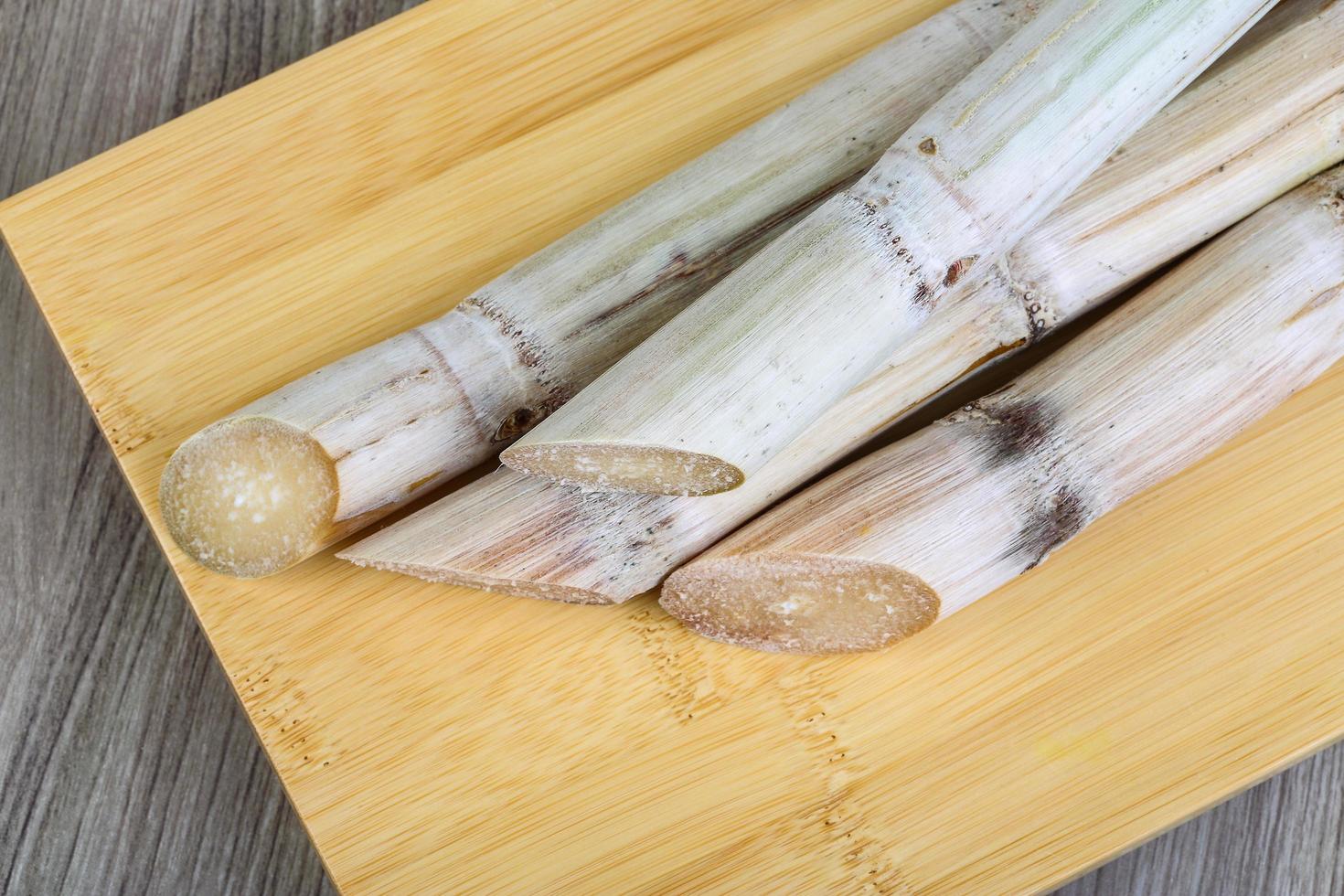 Sugar sticks on wood photo