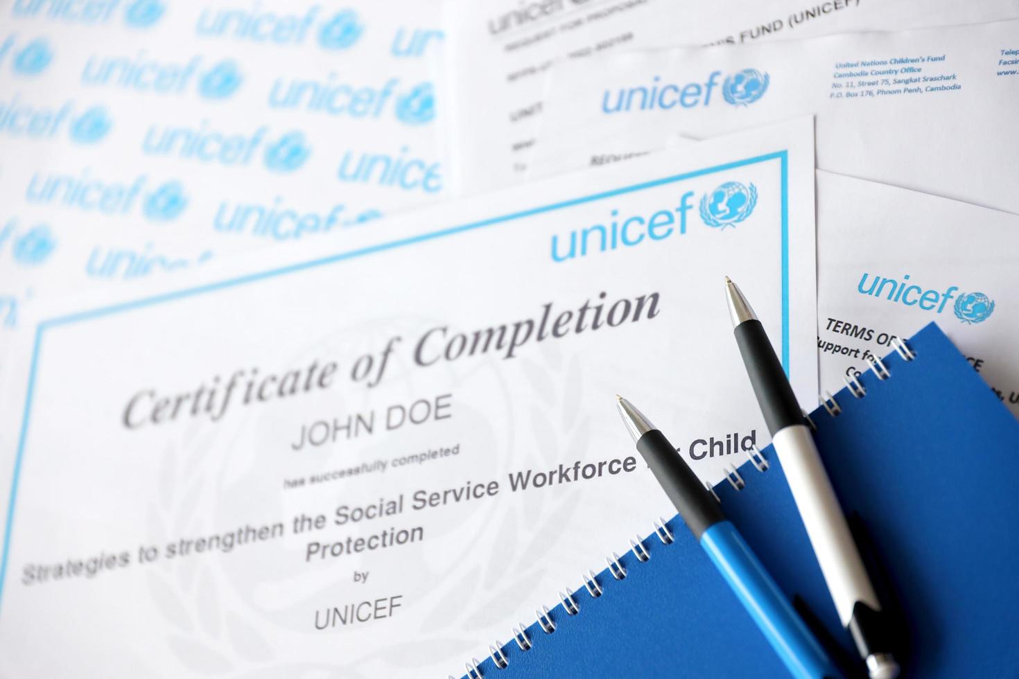 TERNOPIL, UKRAINE - MAY 2, 2022 Volunteer certificate of completion from UNICEF - United Nations programm that provides humanitarian and developmental assistance to children photo