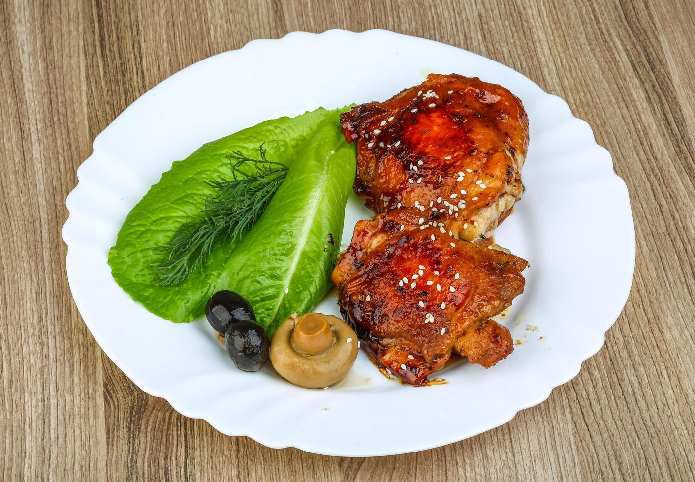 Teriyaki chicken on wood photo