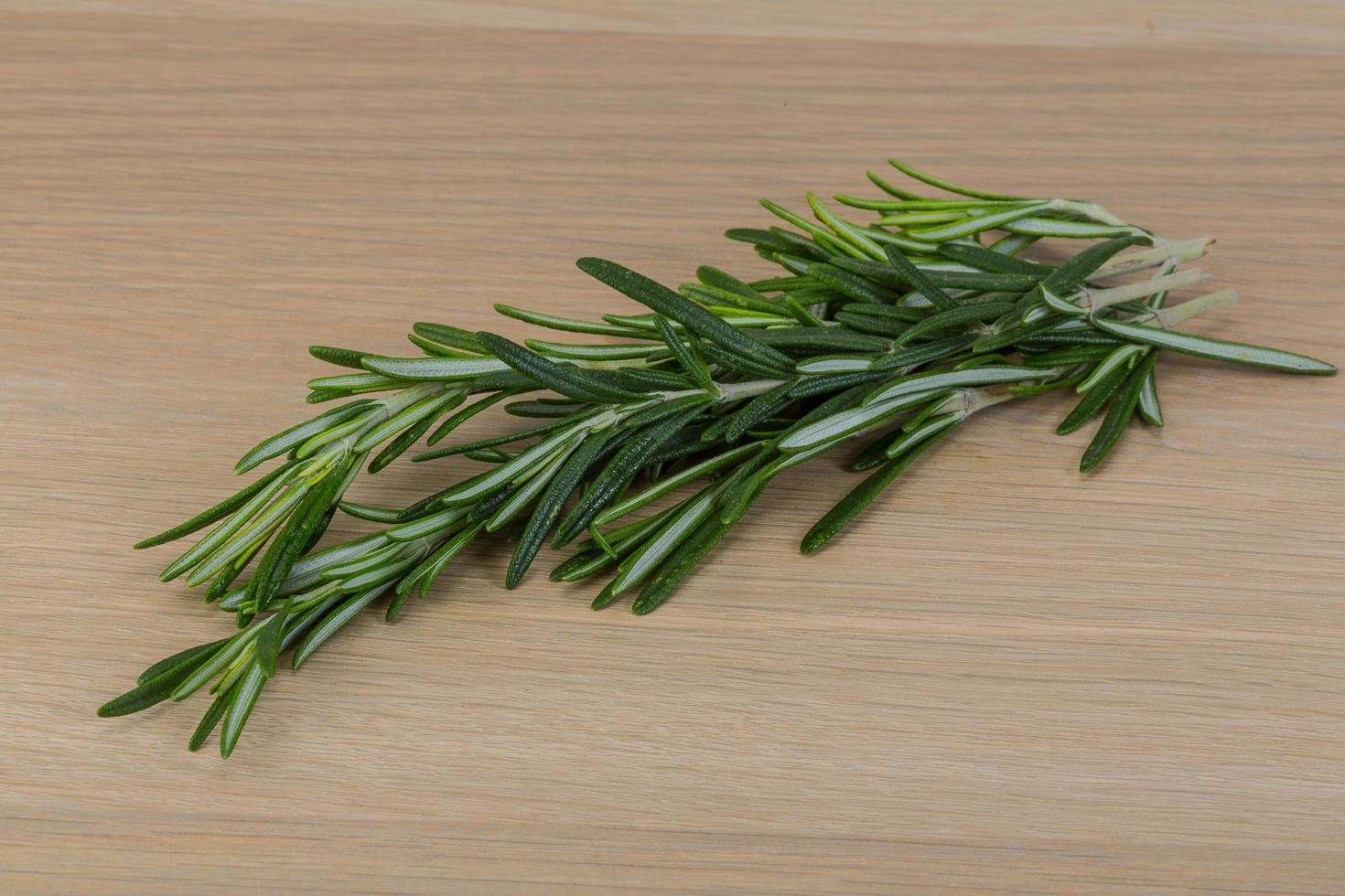 Rosemary on wood photo