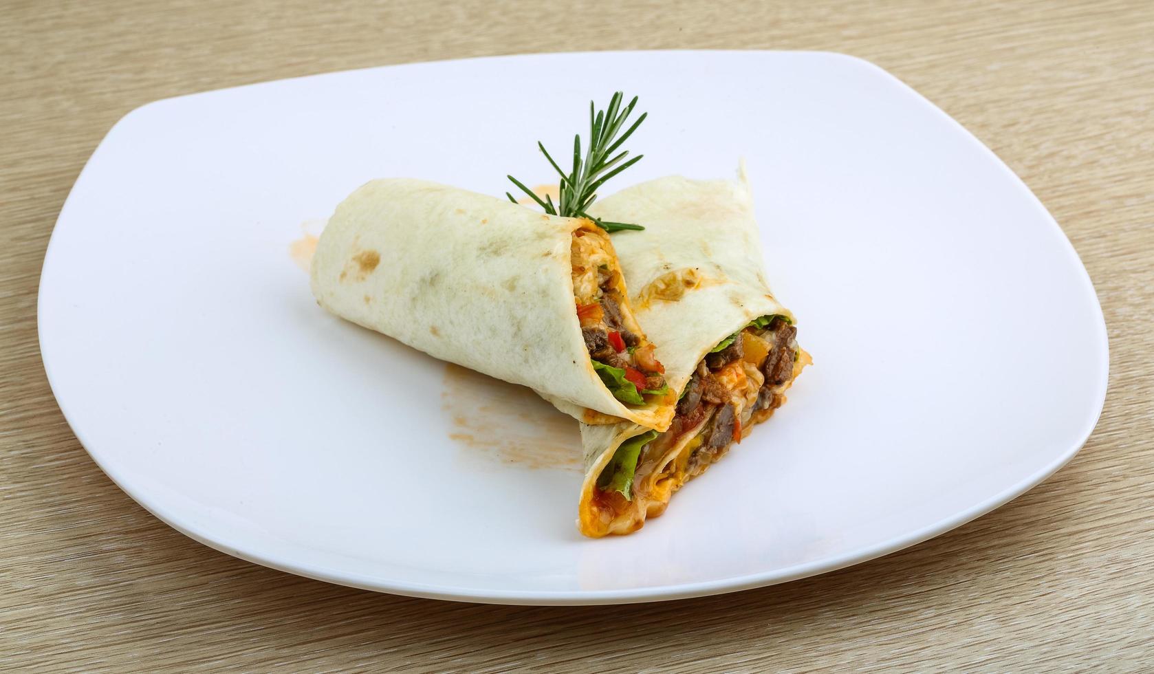 Wrap tortilla on wood photo