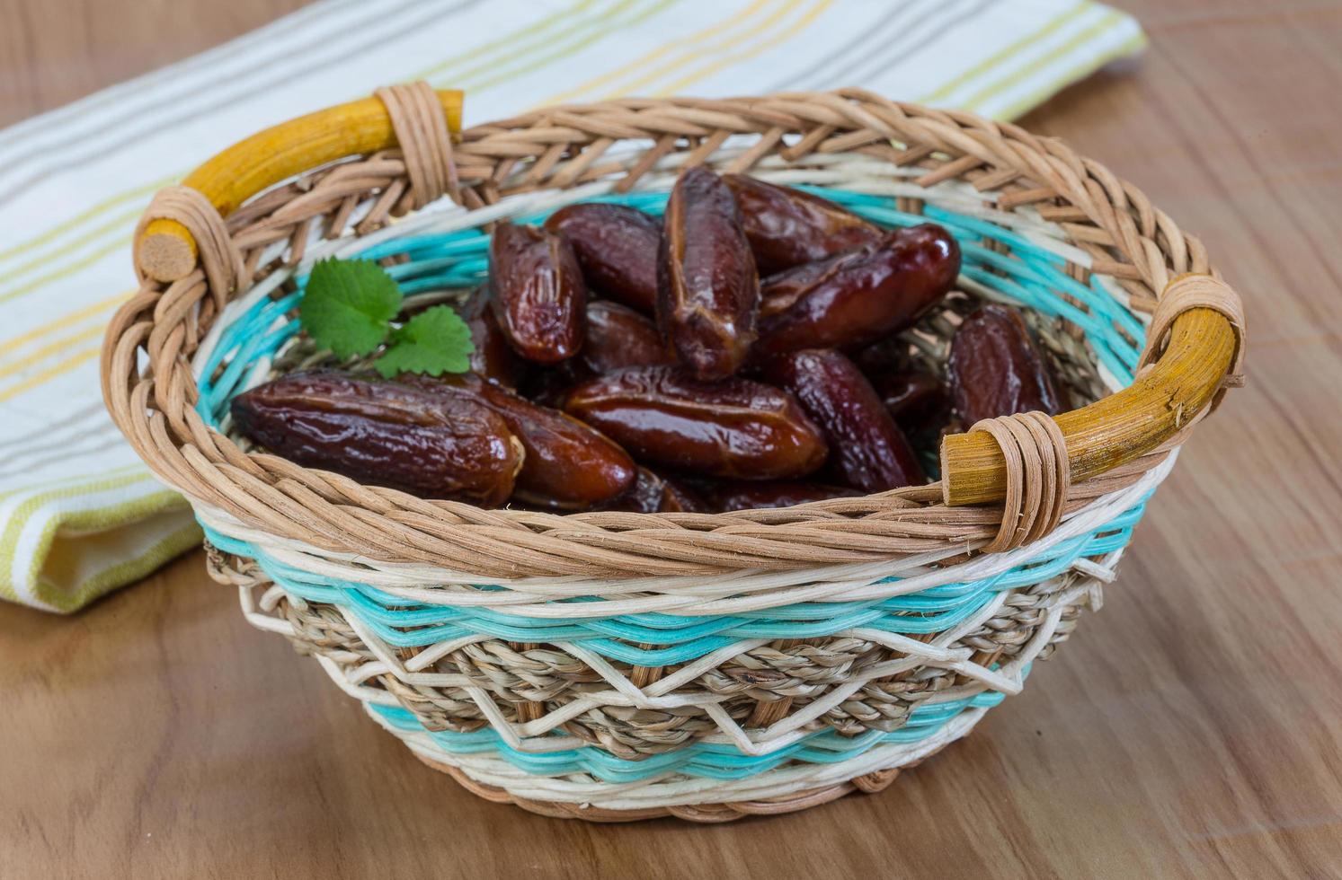 Dates fruit on wood photo