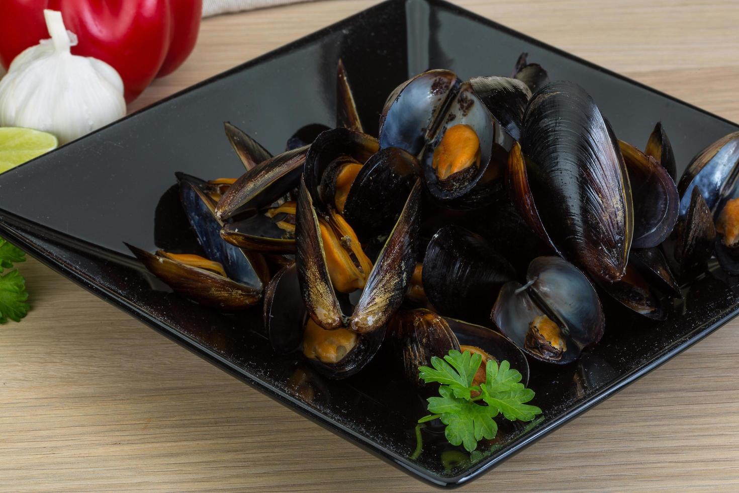 Mussels on wood photo