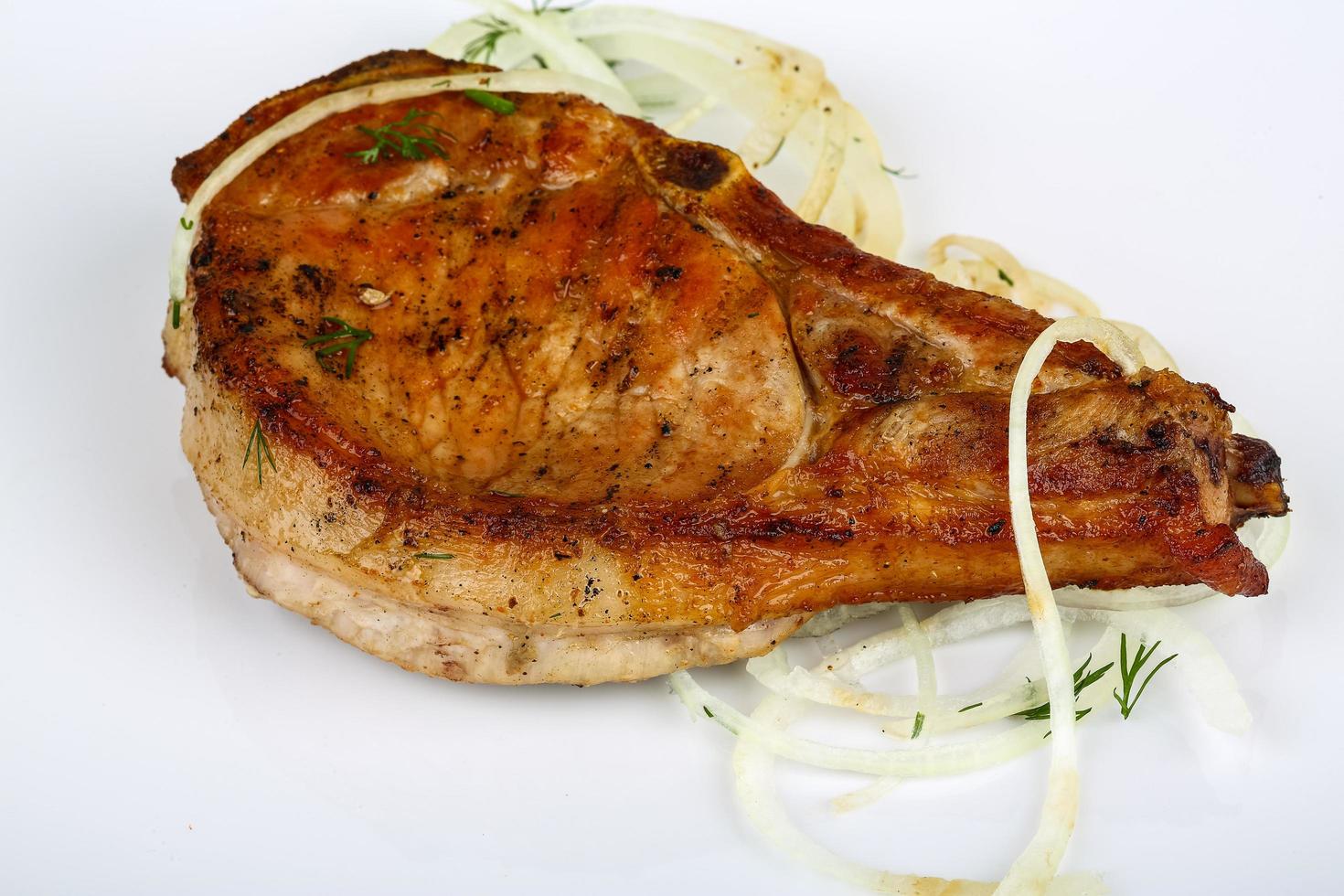 Grilled pork on wood photo