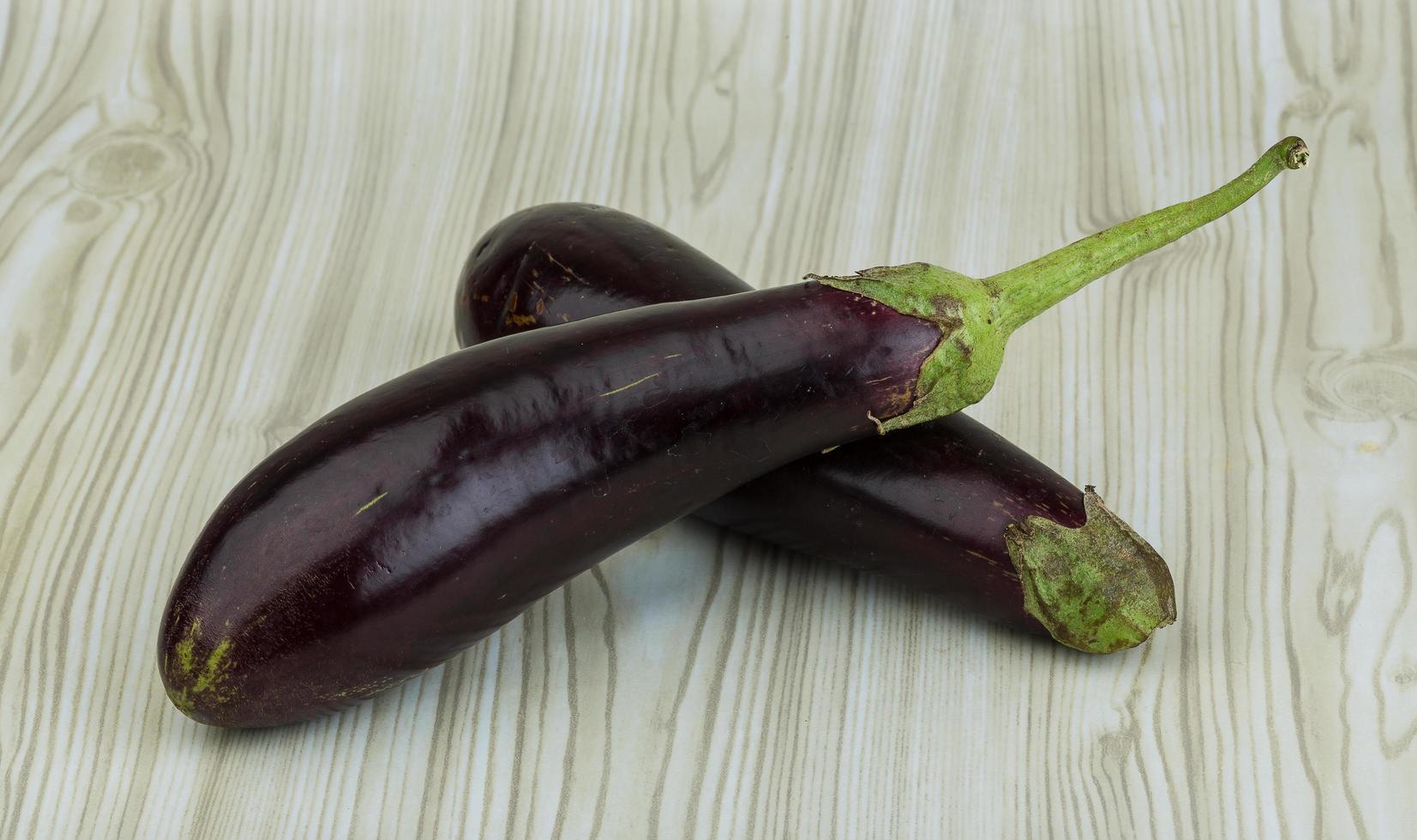 Aubergine on wood photo