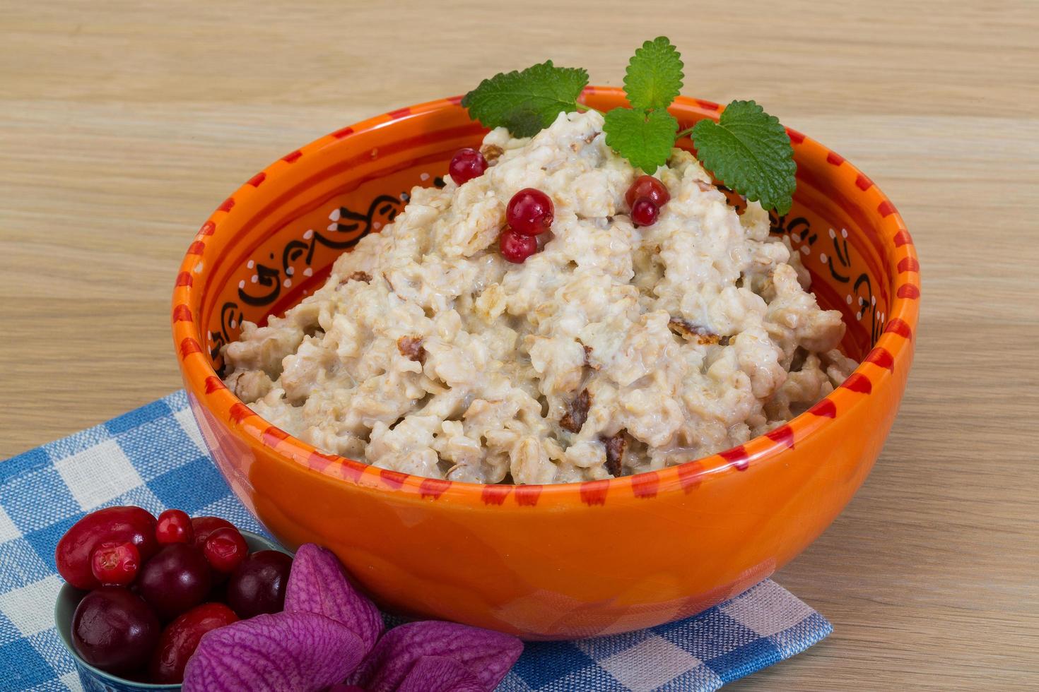 Oatmeal on wood photo