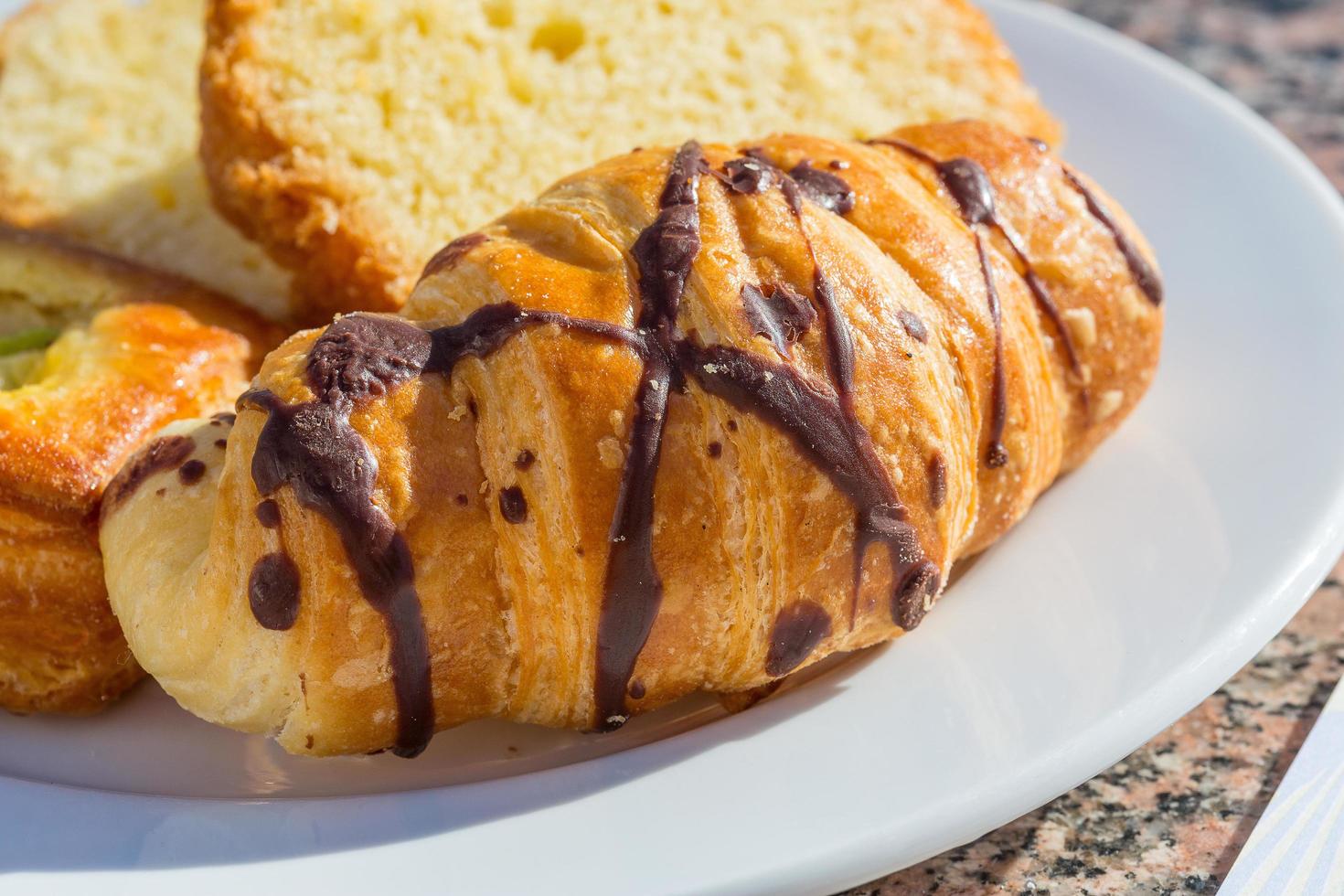 Croissant on wood photo