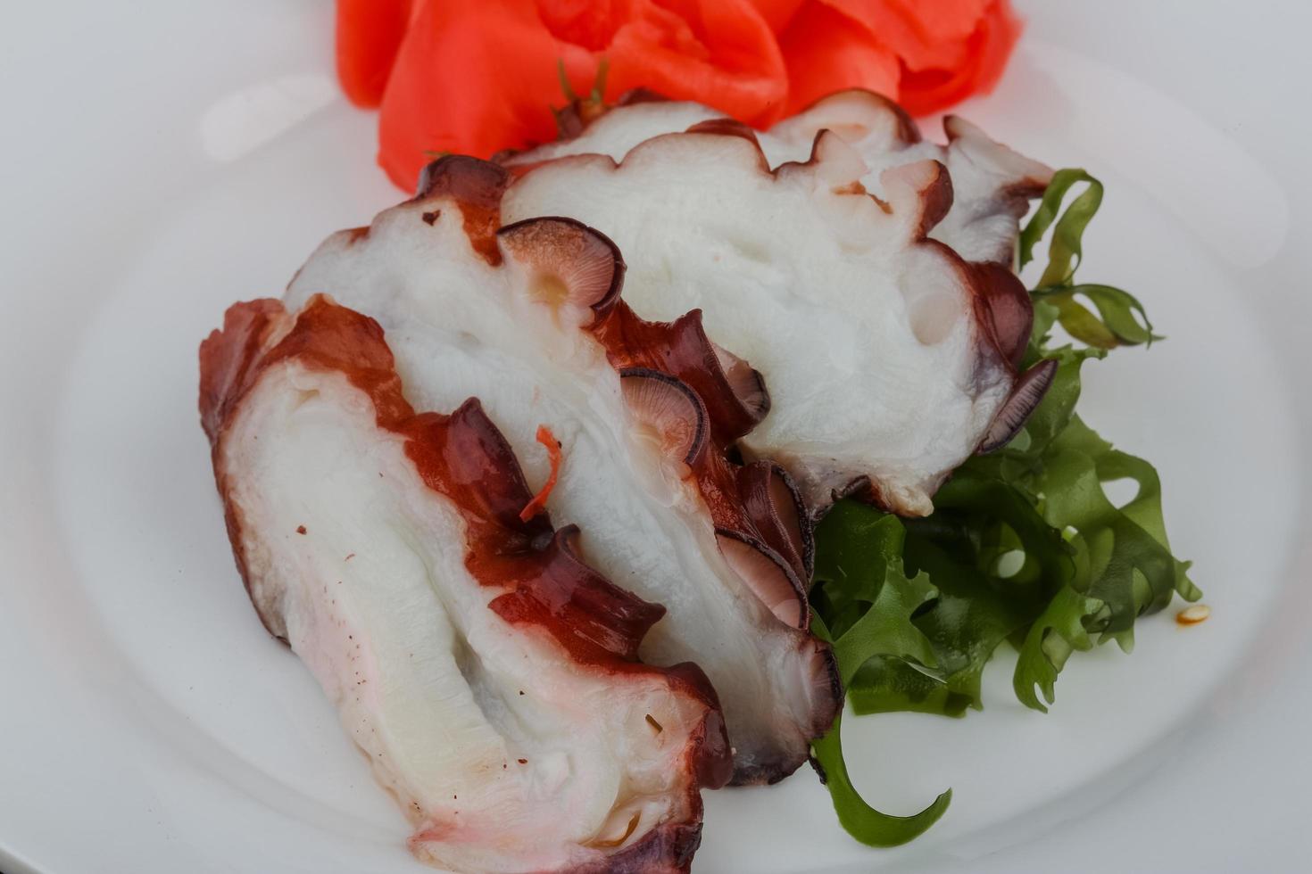 Octopus sashimi dish 12772810 Stock Photo at Vecteezy