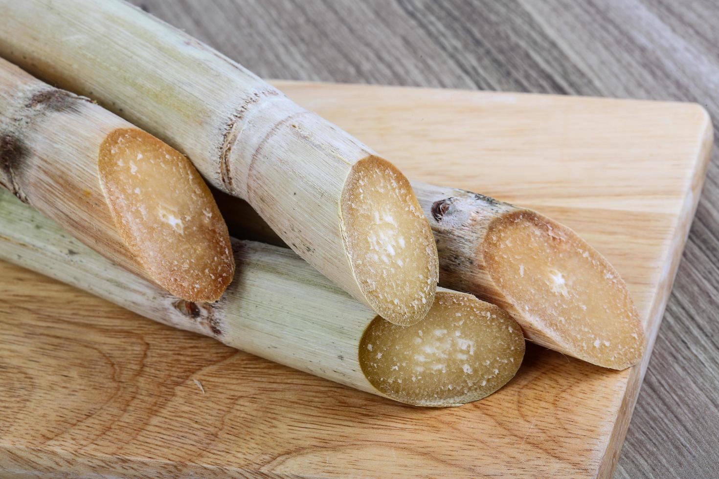 Sugar sticks on wood photo