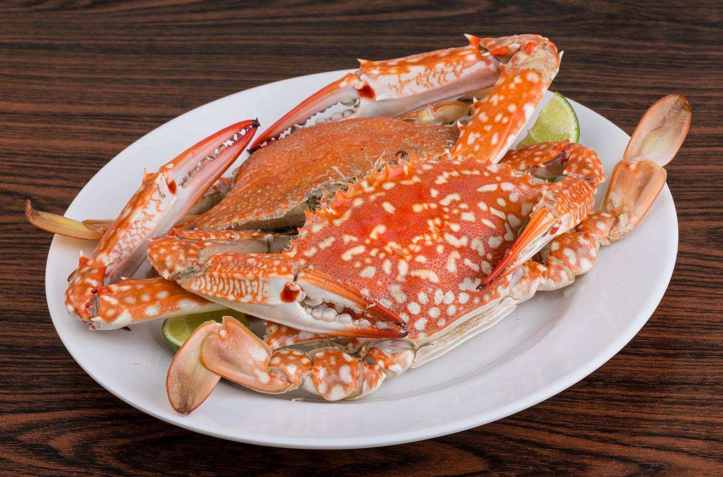 Boiled crabs on wood photo