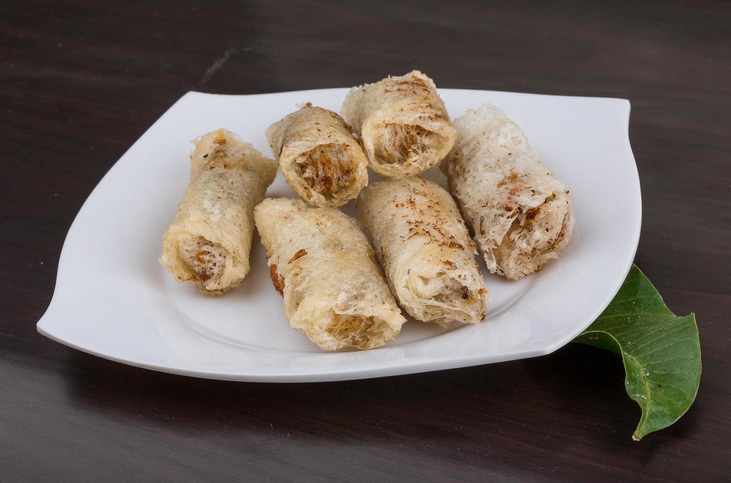 Spring rolls on wood photo