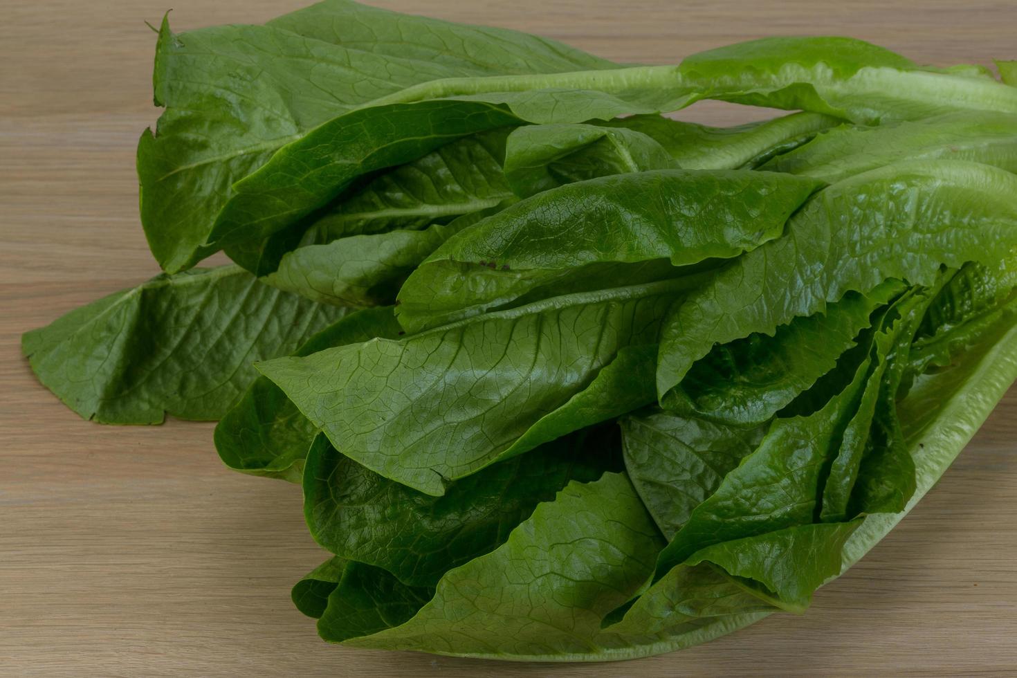 Romano salad on wood photo