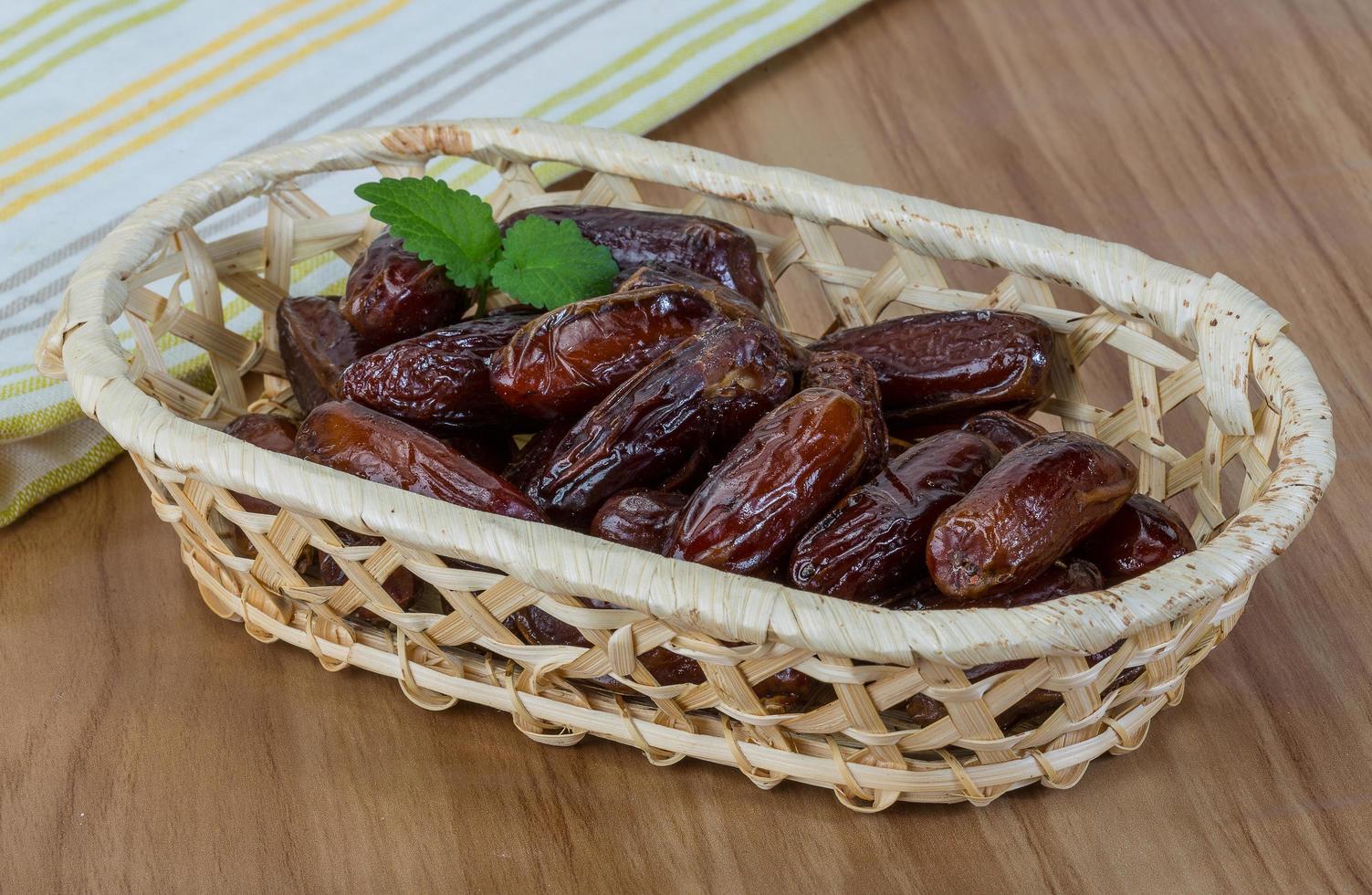 Dates fruit on wood photo
