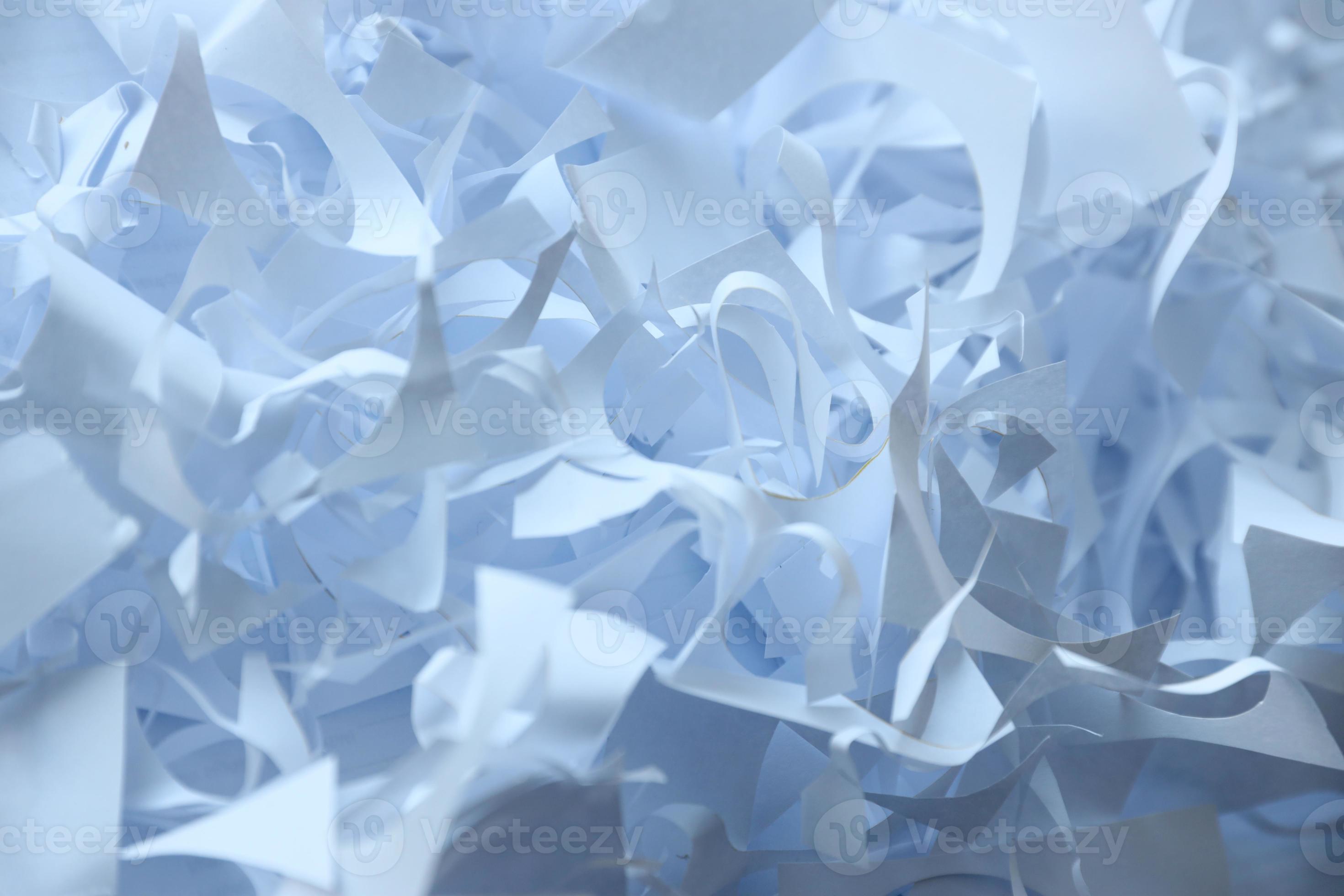 Shredded paper texture background, top view of many white paper strips