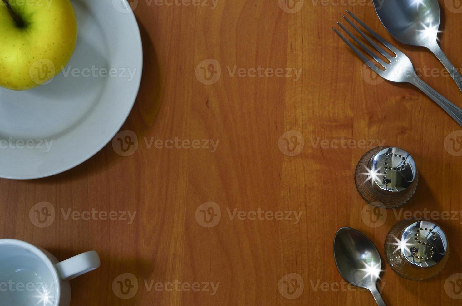 Kitchen appliances on wood background with space for text photo