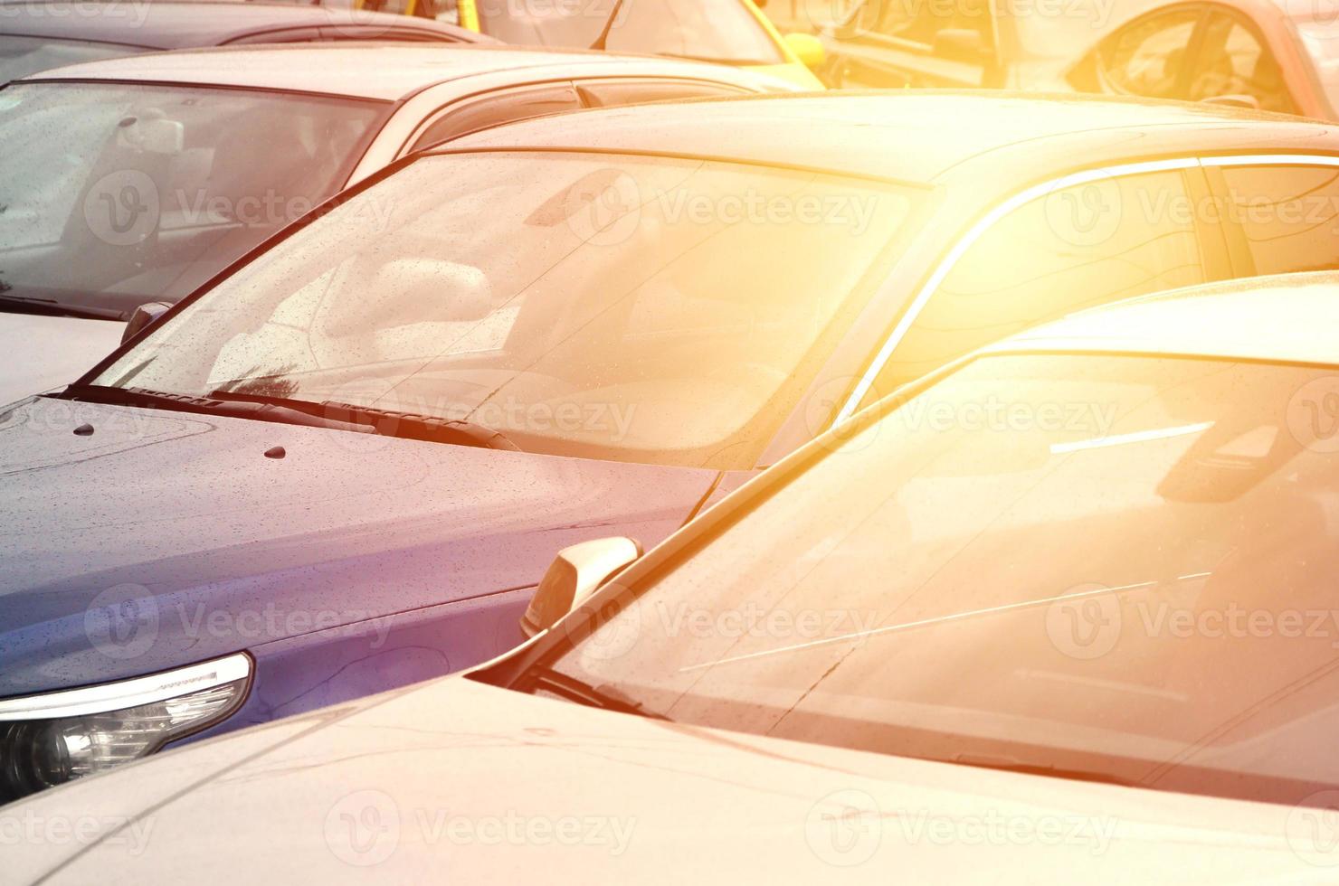 Roofs of several cars. A lot of cars stand close at rush hour photo