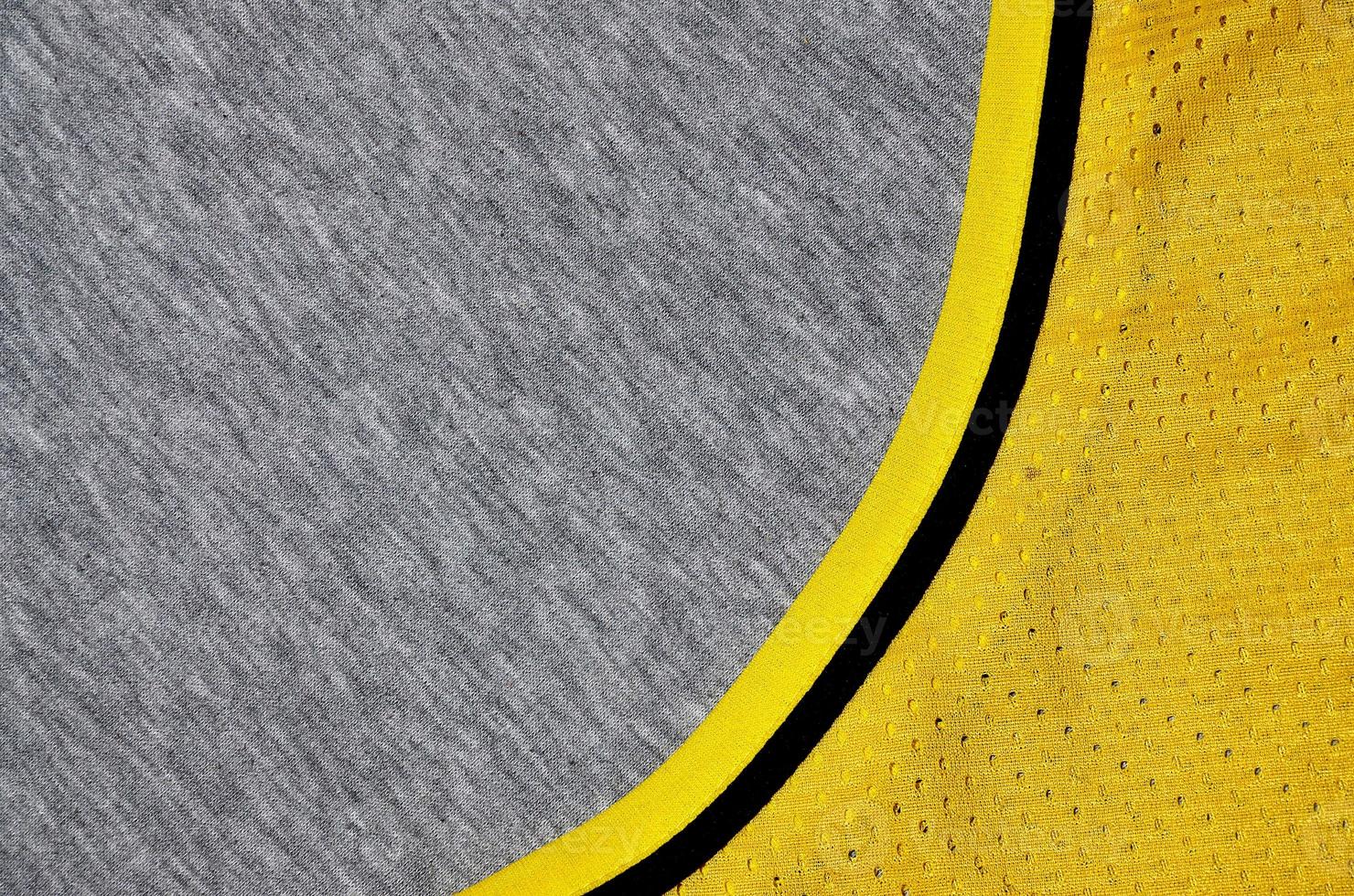 Top view of cloth textile surface. Close-up rumpled heater and knitted fabric texture with a thin striped pattern. Sport clothing fabric texture. Colored basketball shirt and heater hoodie photo