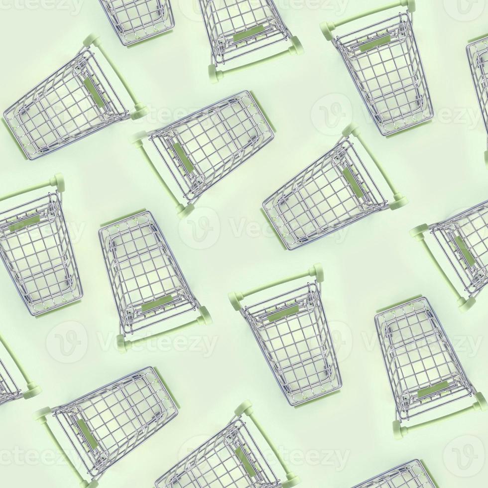 Pattern of many small shopping carts on a lime background photo