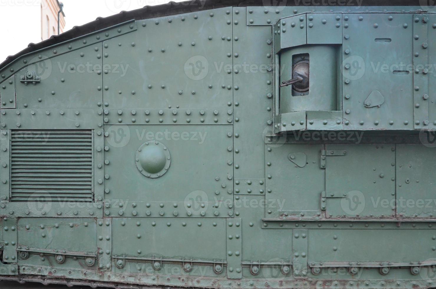 Abstract green industrial metal textured background with rivets and bolts photo