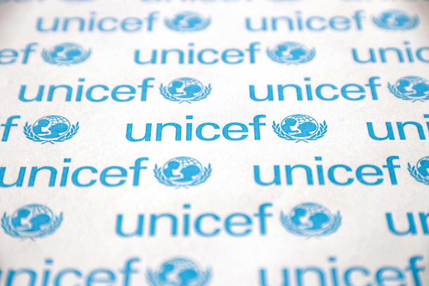 TERNOPIL, UKRAINE - MAY 2, 2022 Unicef logo on paper. Unicef is a United Nations programm that provides humanitarian and developmental assistance to children and mothers photo