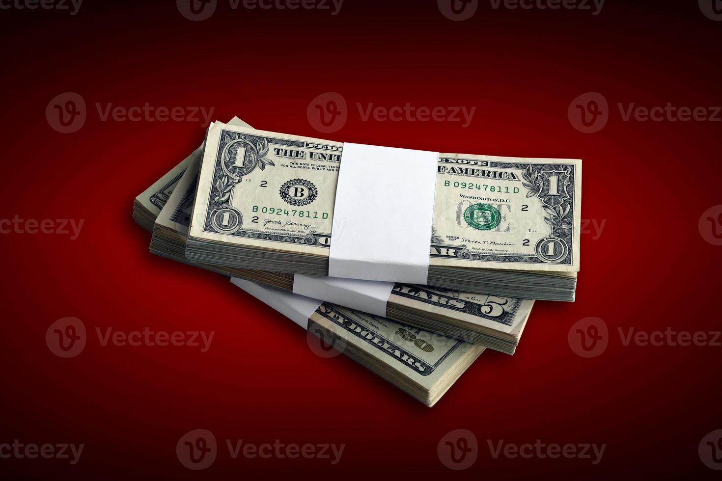 Bundle of US dollar bills isolated on white. Pack of american money with high resolution on perfect white background photo