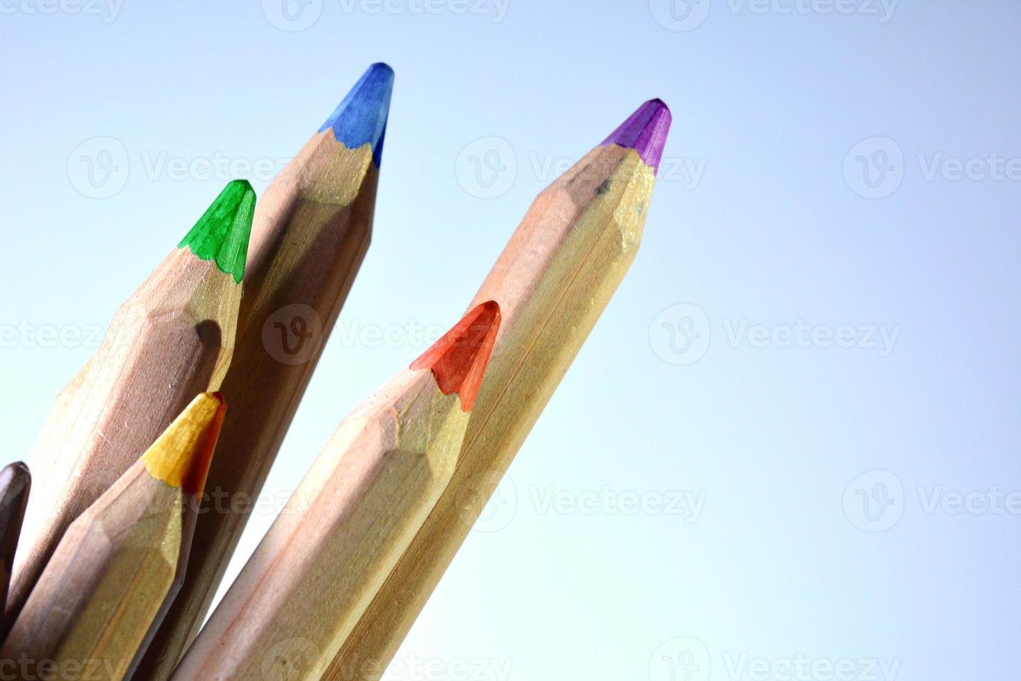 Wooden-color pencils in landscape view photo
