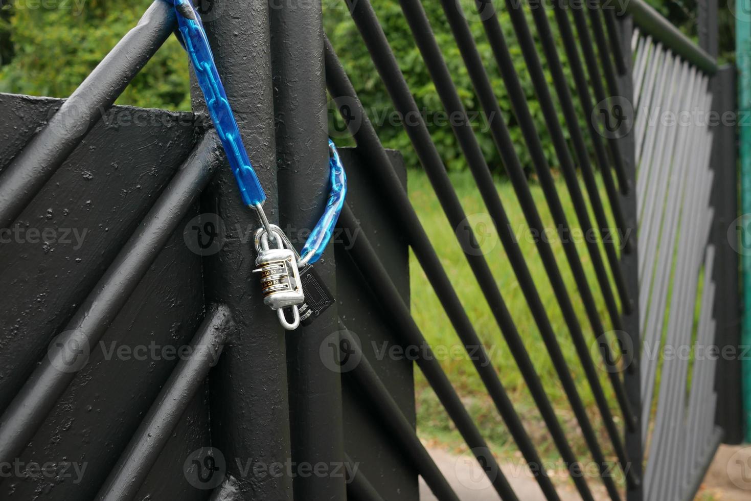date door was locked with padlocks and chains photo