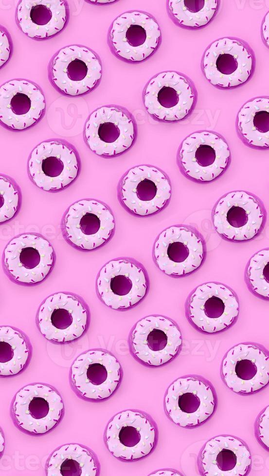 Many small plastic donuts lies on a pastel colorful background. Flat lay minimal pattern. Top view photo