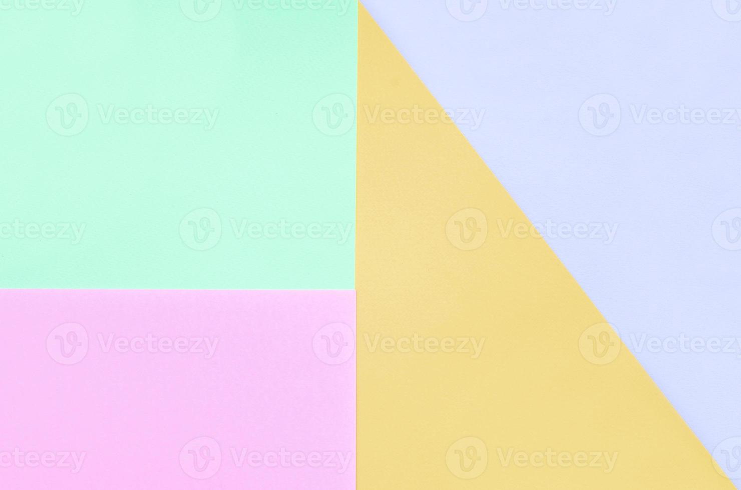 Texture background of fashion pastel colors. Pink, violet, orange and blue geometric pattern papers. photo