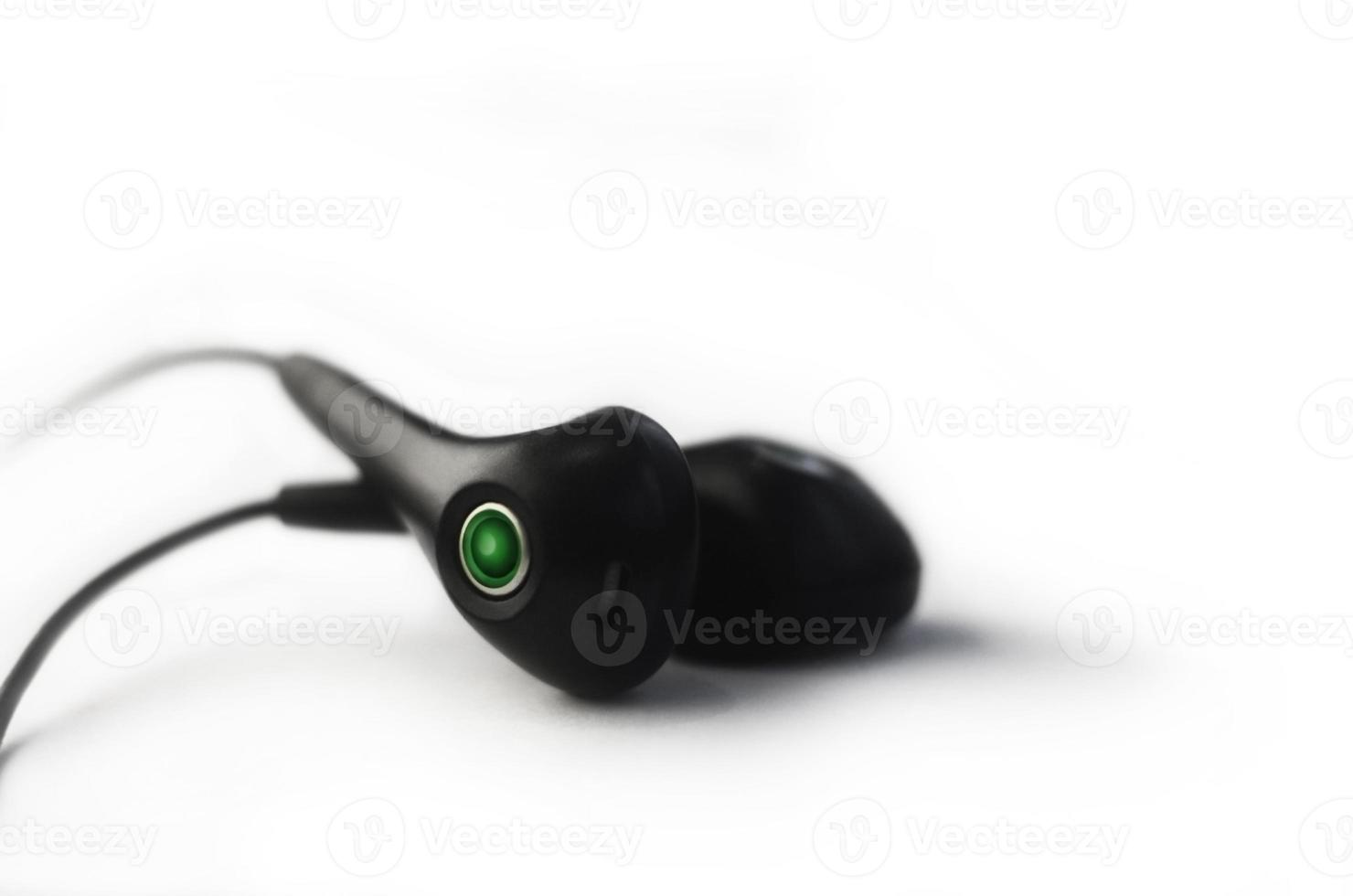 Earphones isolated on white photo