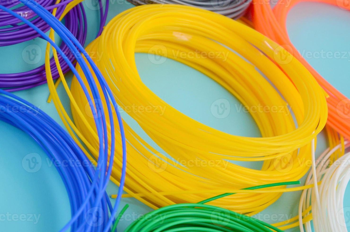 Plastic PLA and ABS filament material for printing on a 3D pen or printer of various colors photo