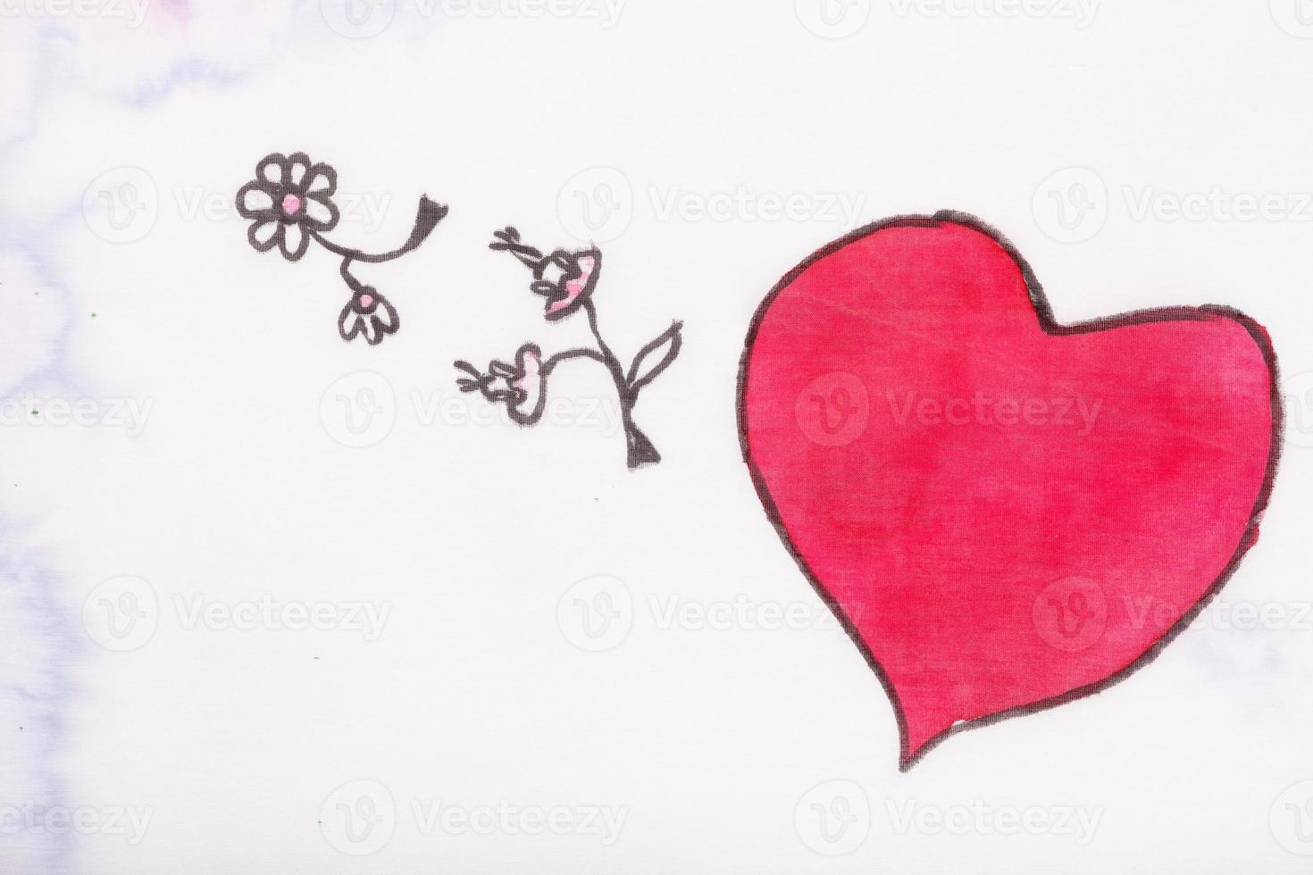 red heart and flowers close up hand photo