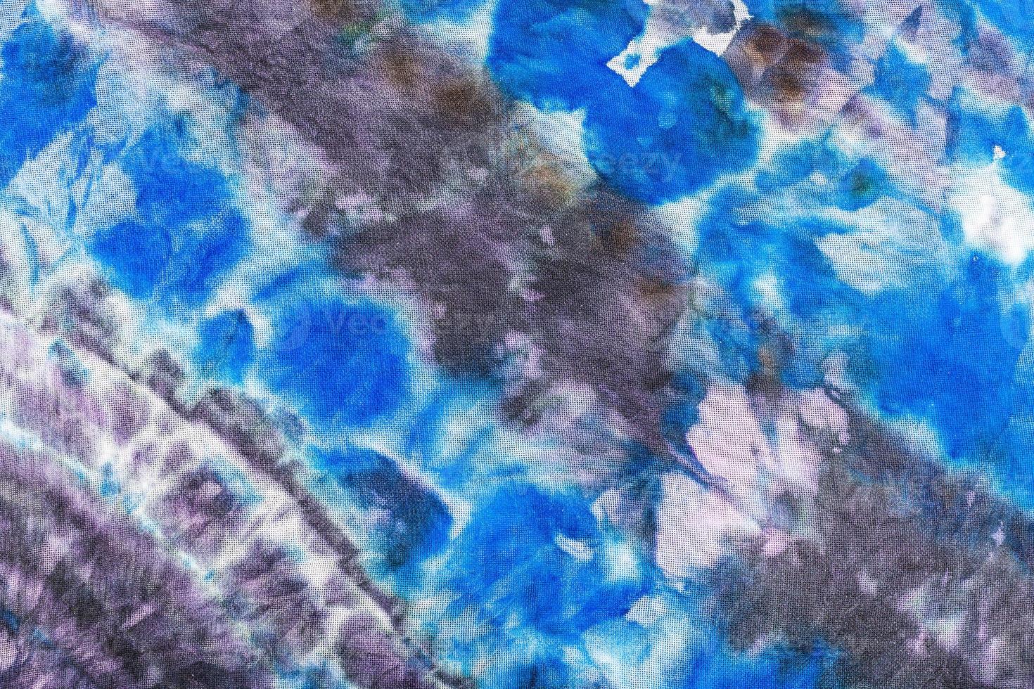 abstract blue and violet striped pattern on batik photo