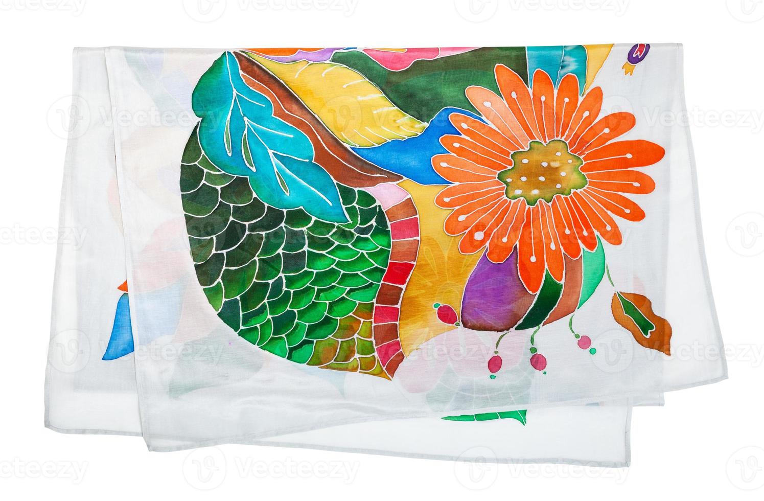 folded silk scarf with hand-drawn flowers isolated photo