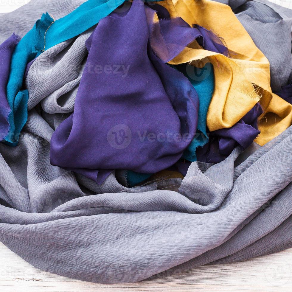 fabrics of wrapped sewn but not yet hemmed scarf photo