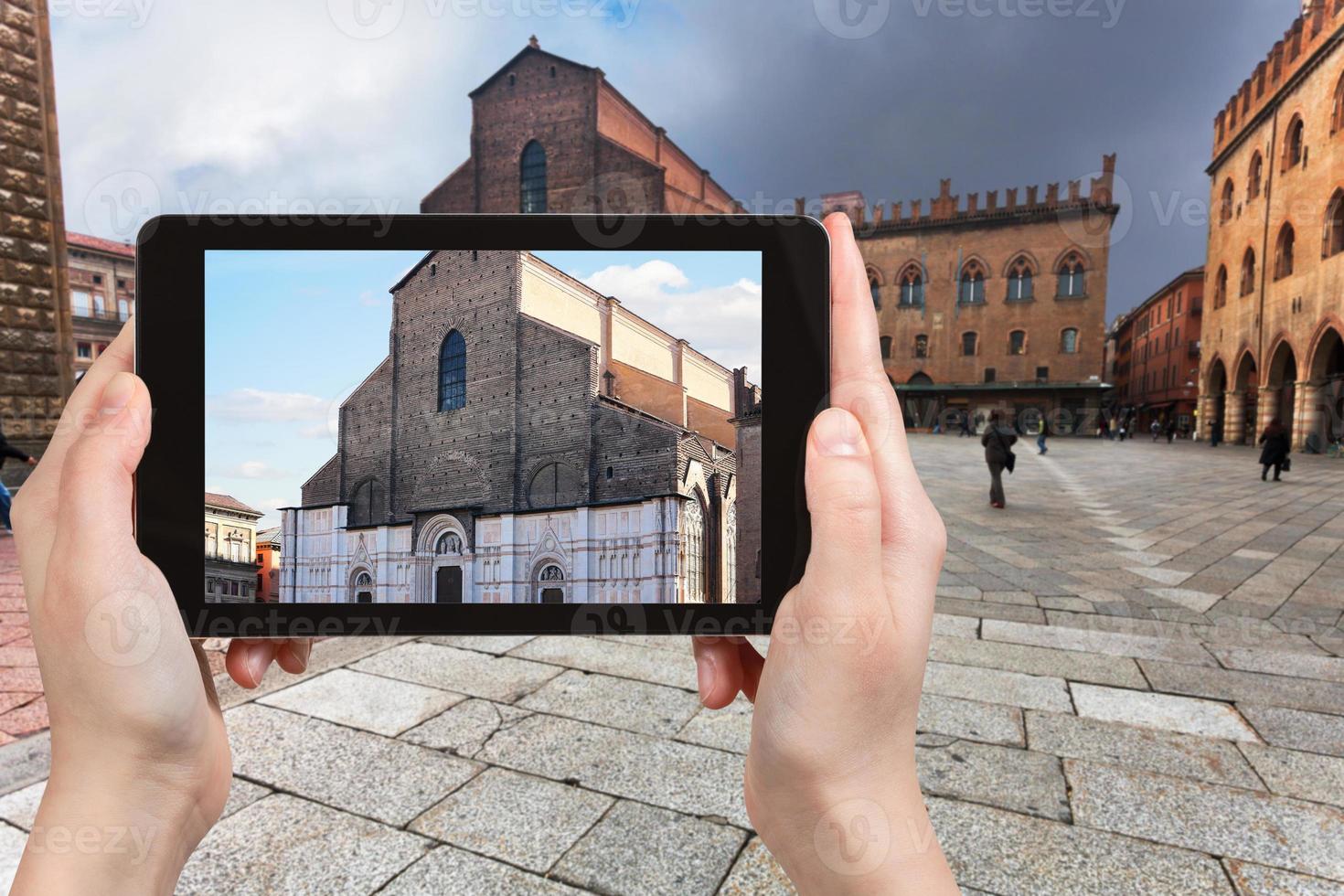 tourist photographs basilica in Bologna city photo