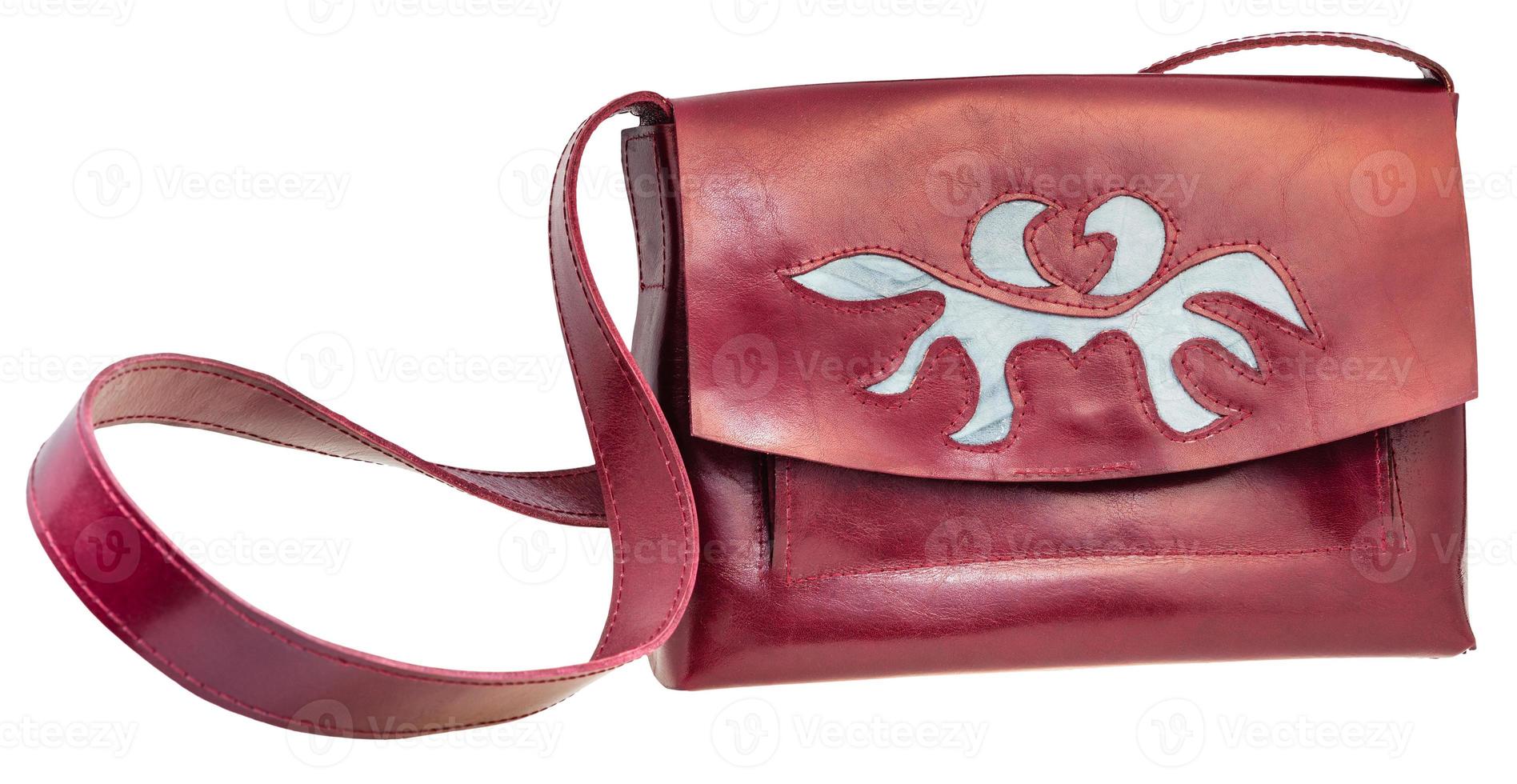 front view of cherry color handbag with applique photo