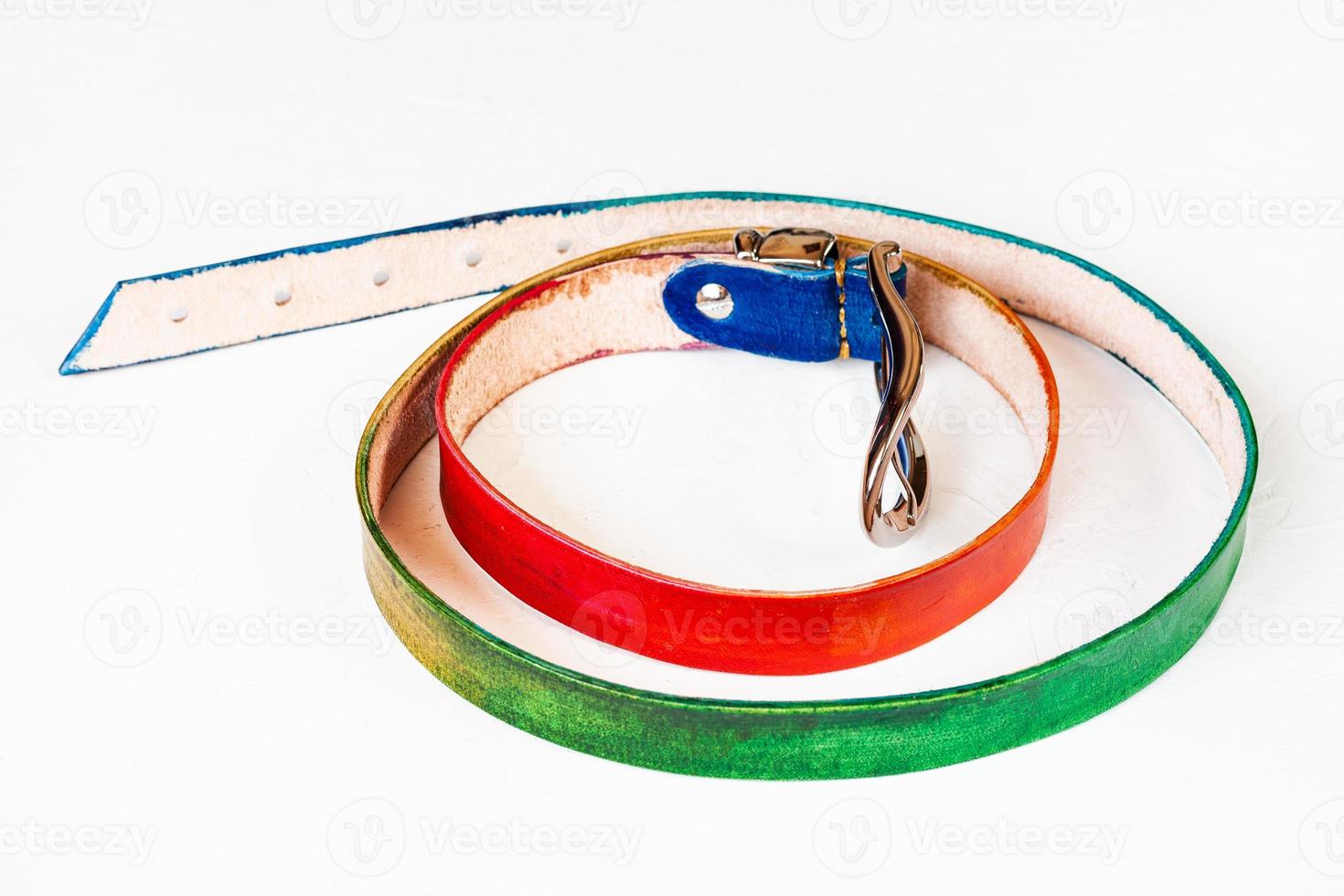 handmade rainbow coloured leather belt on white photo