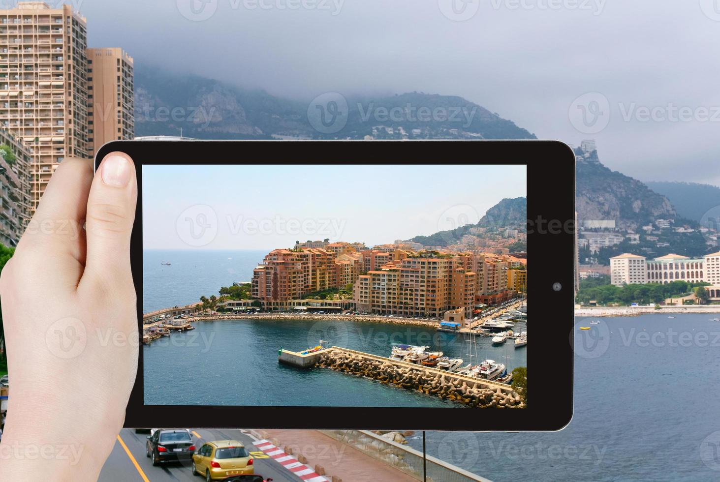 travel concept - tourist taking photo of Monaco city