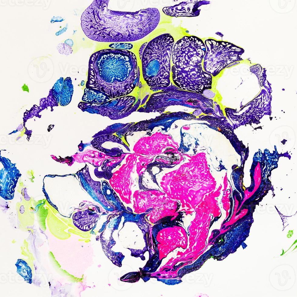 abstract paper marbling with blue and pink paints photo