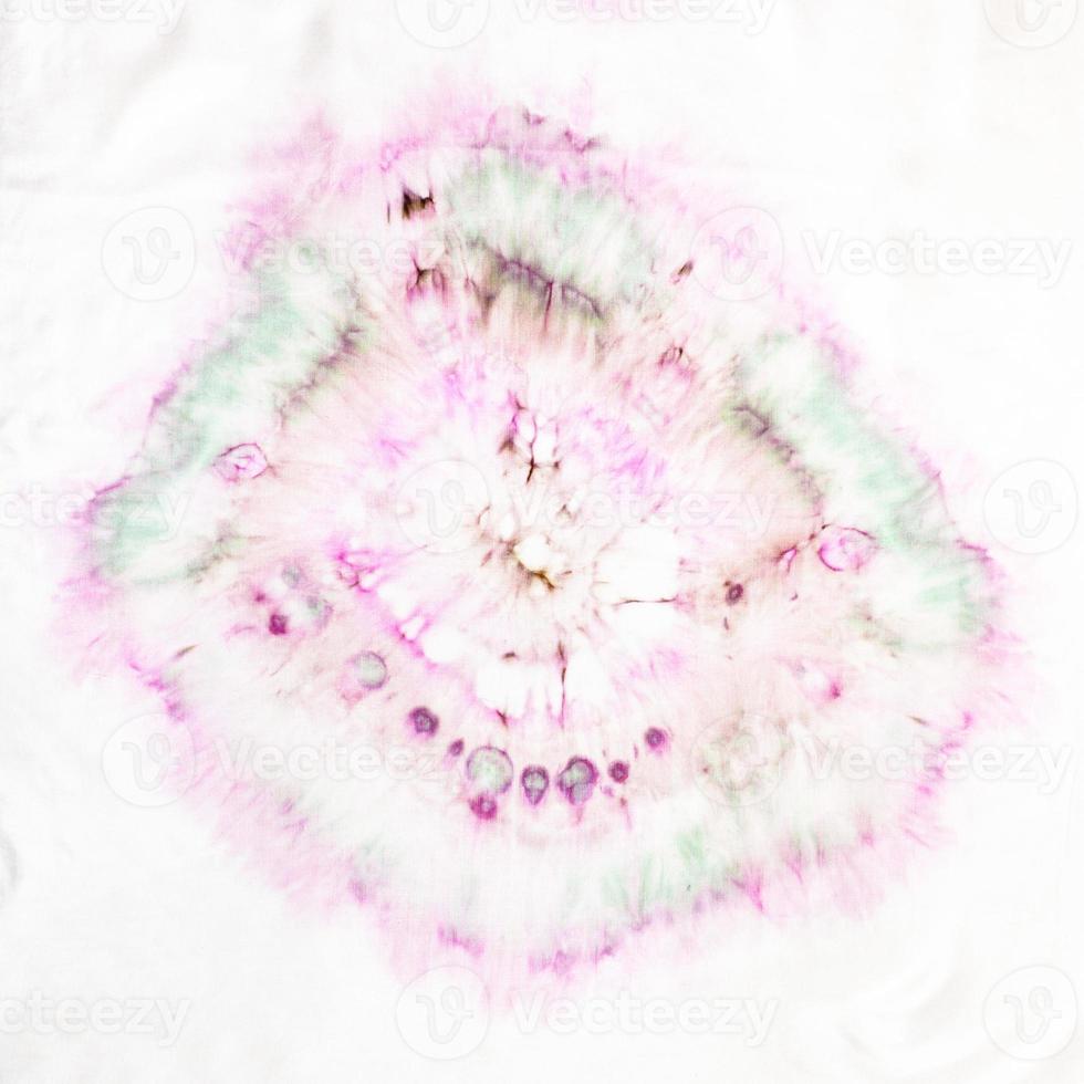 abstract spot in tie-dye batik on white silk photo