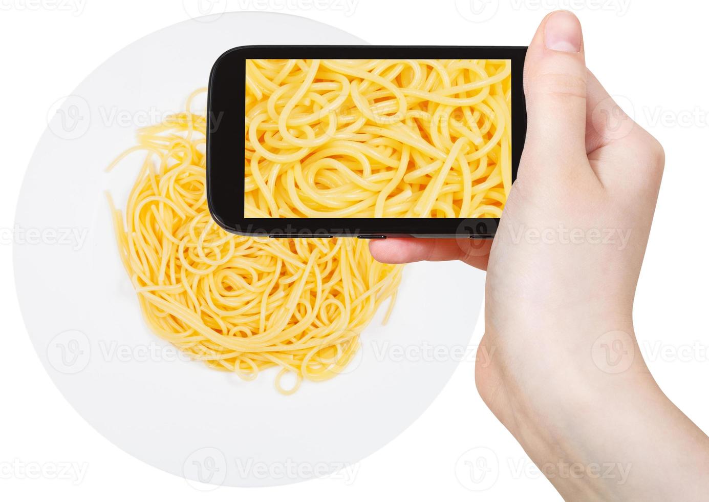 tourist photographs of spaghetti al burro on plate photo