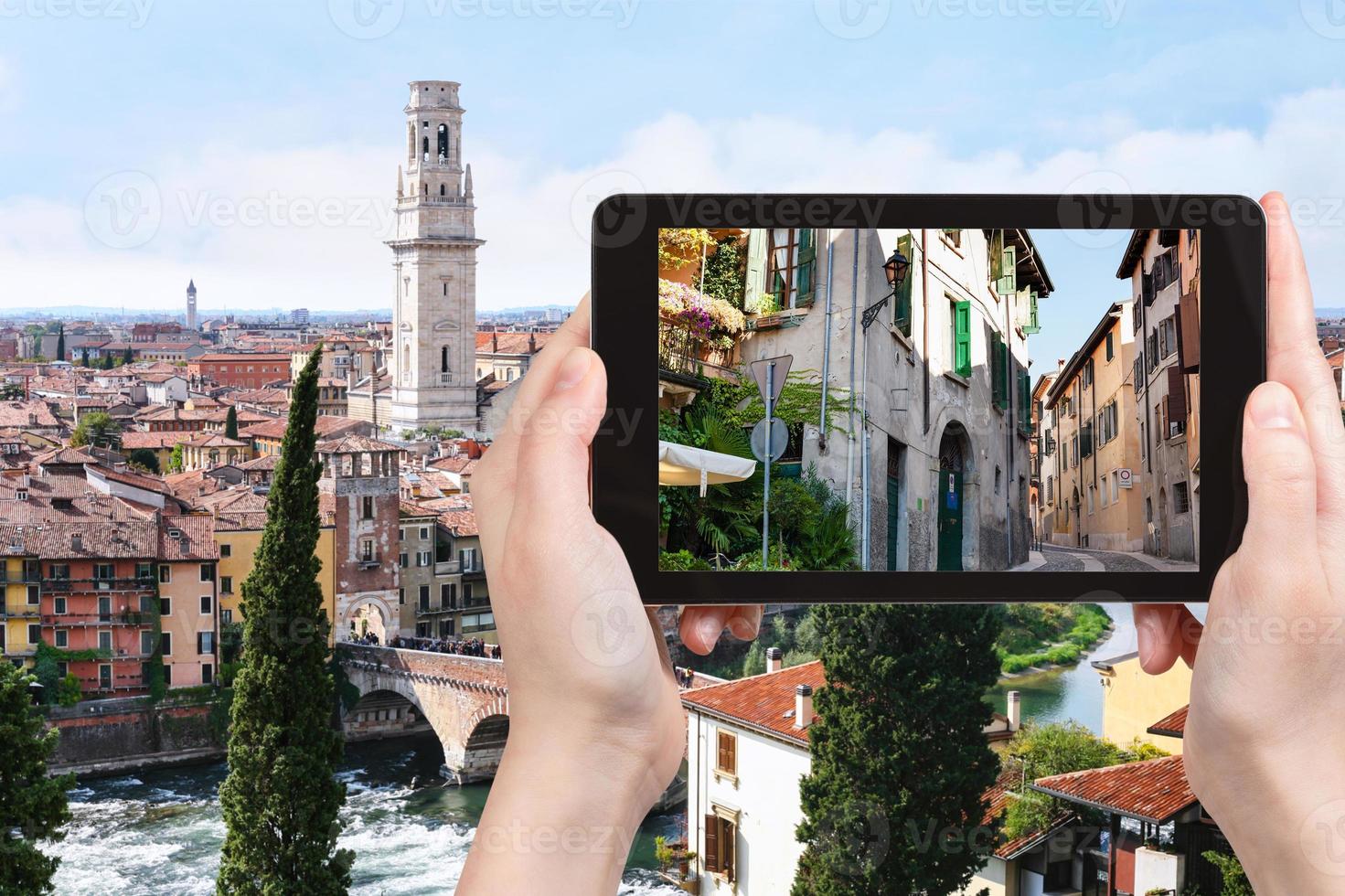 tourist photographs street in Verona city photo