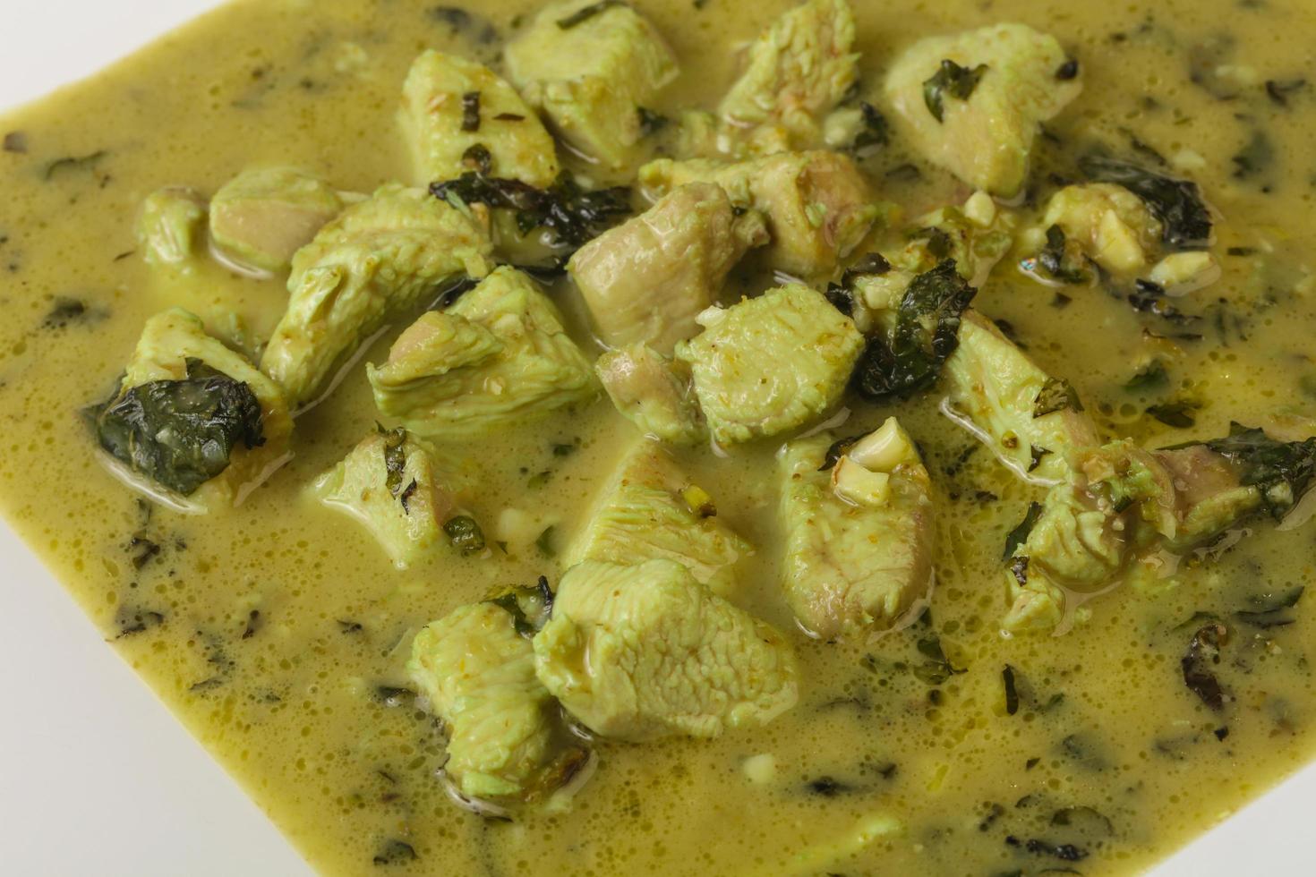 Green Curry on wood photo