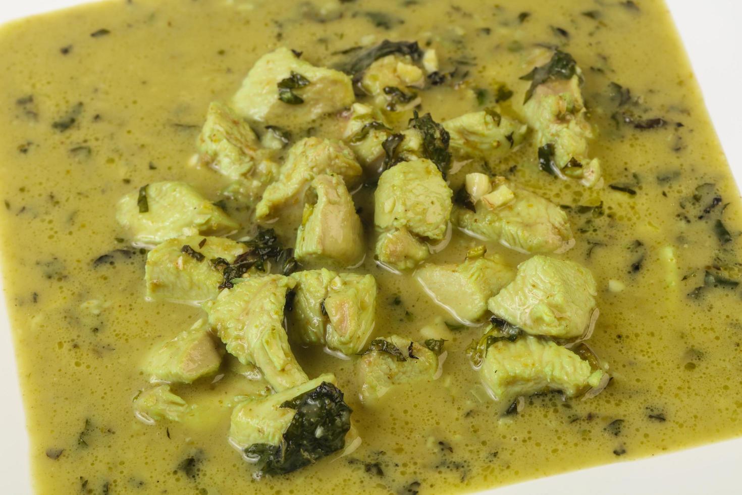 Green Curry on wood photo