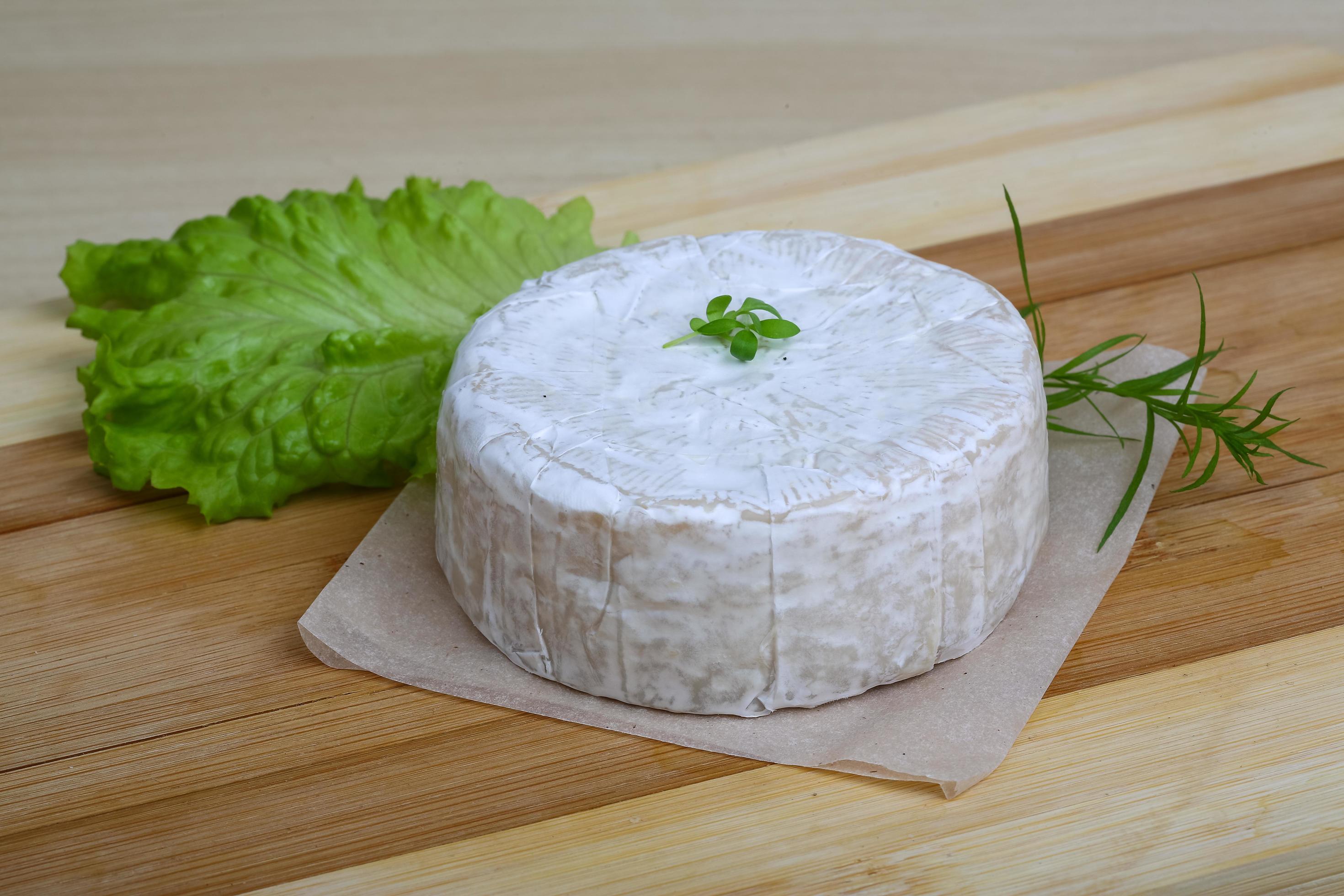Brie cheese dish 12783580 Stock Photo at Vecteezy