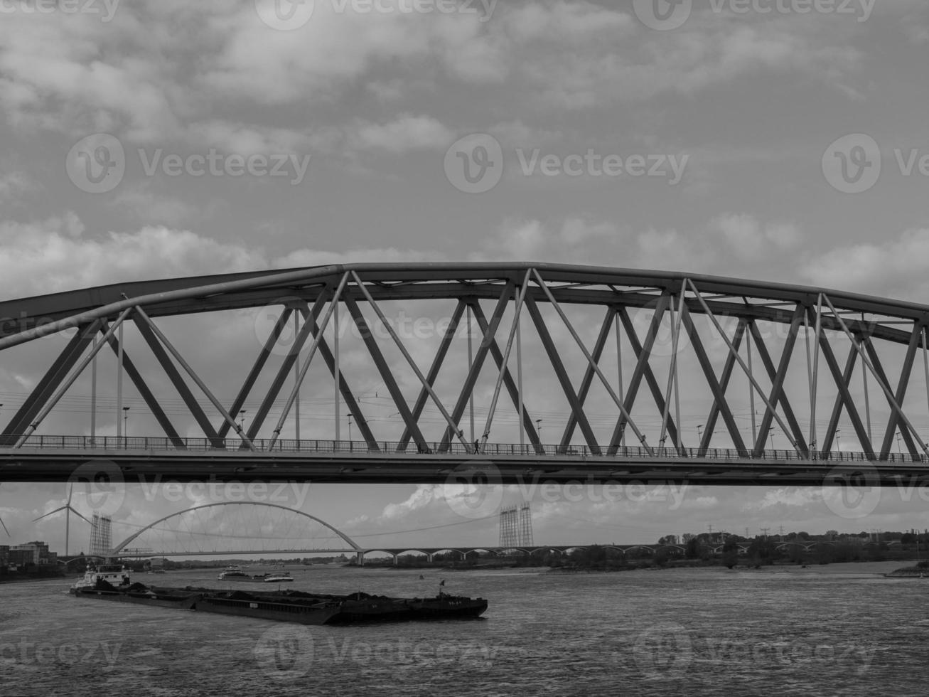 The city of Nijmegen at the river waal in the netherlands photo